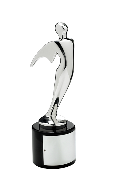 A shiny silver trophy shaped like a stylized human figure stands on a round black base with a blank metal plate on the front. The figure has smooth curves and an abstract, modern design.